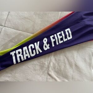 Nike Purple and Gold Leggings